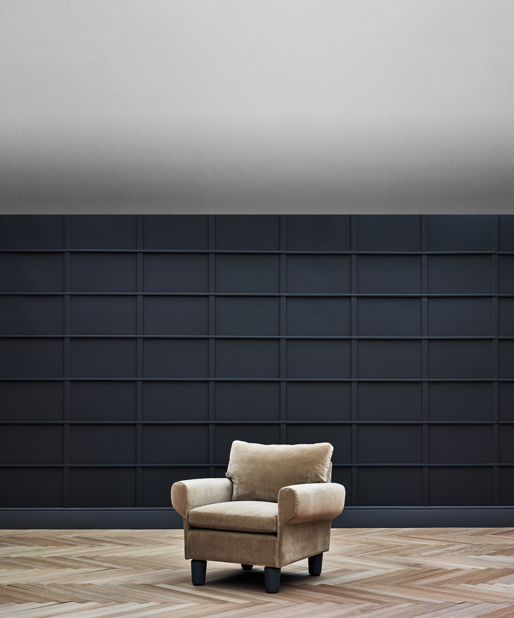 Magnus armchair, suspended base version on oak legs. Designed by Mario Ruiz for Joquer.