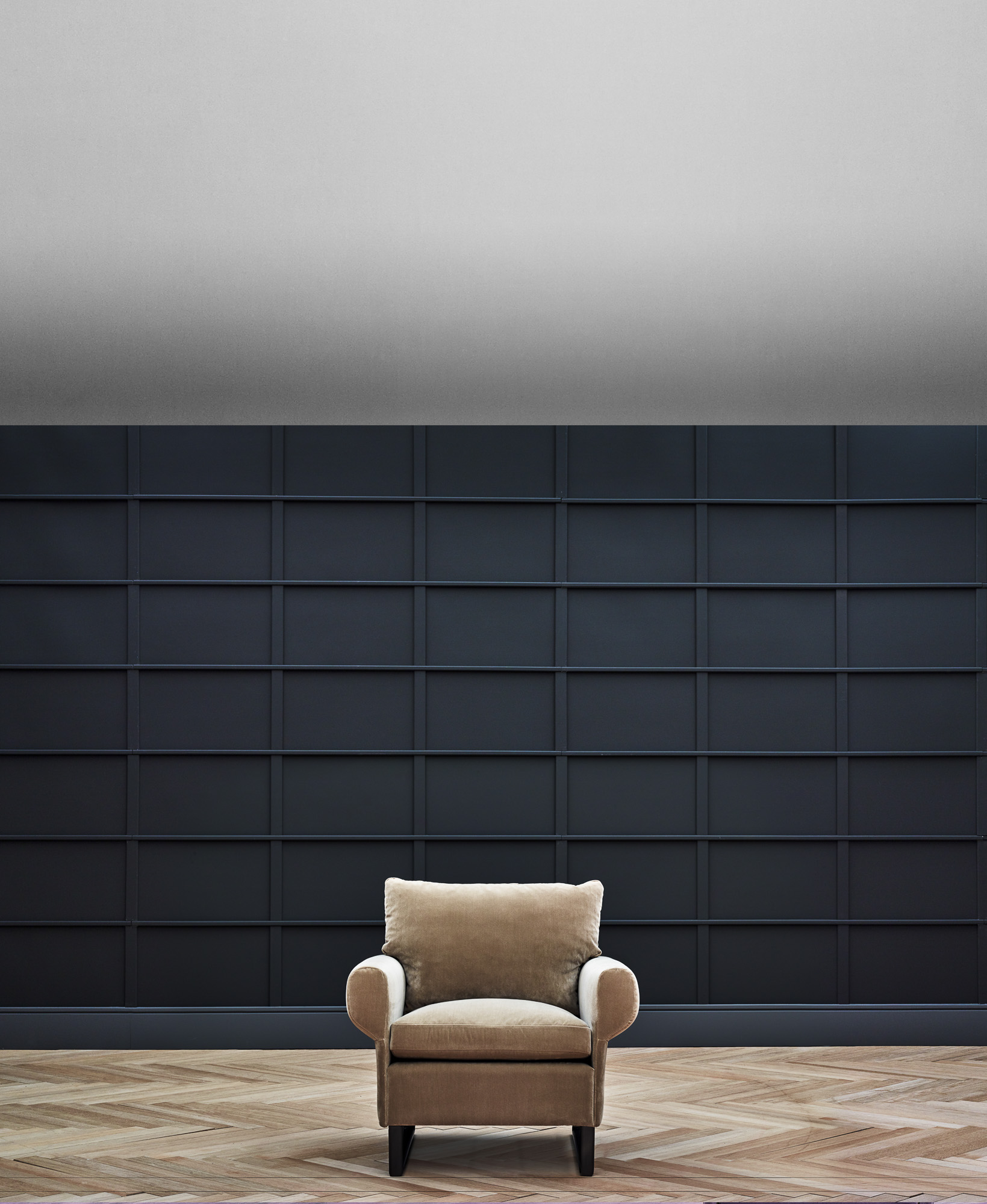Magnus armchair. Suspended base version on U-shaped metal bases. Designed by Mario Ruiz for Joquer.