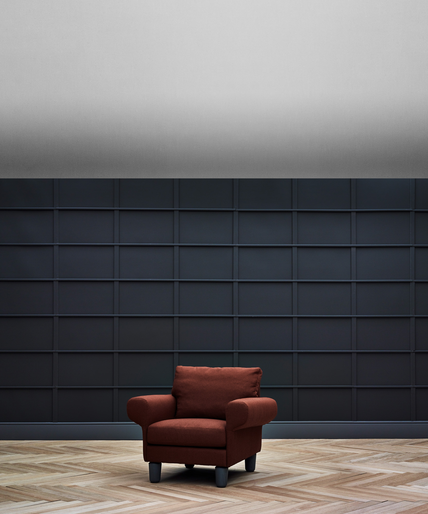 Magnus armchair, suspended base version on oak legs. Designed by Mario Ruiz for Joquer.