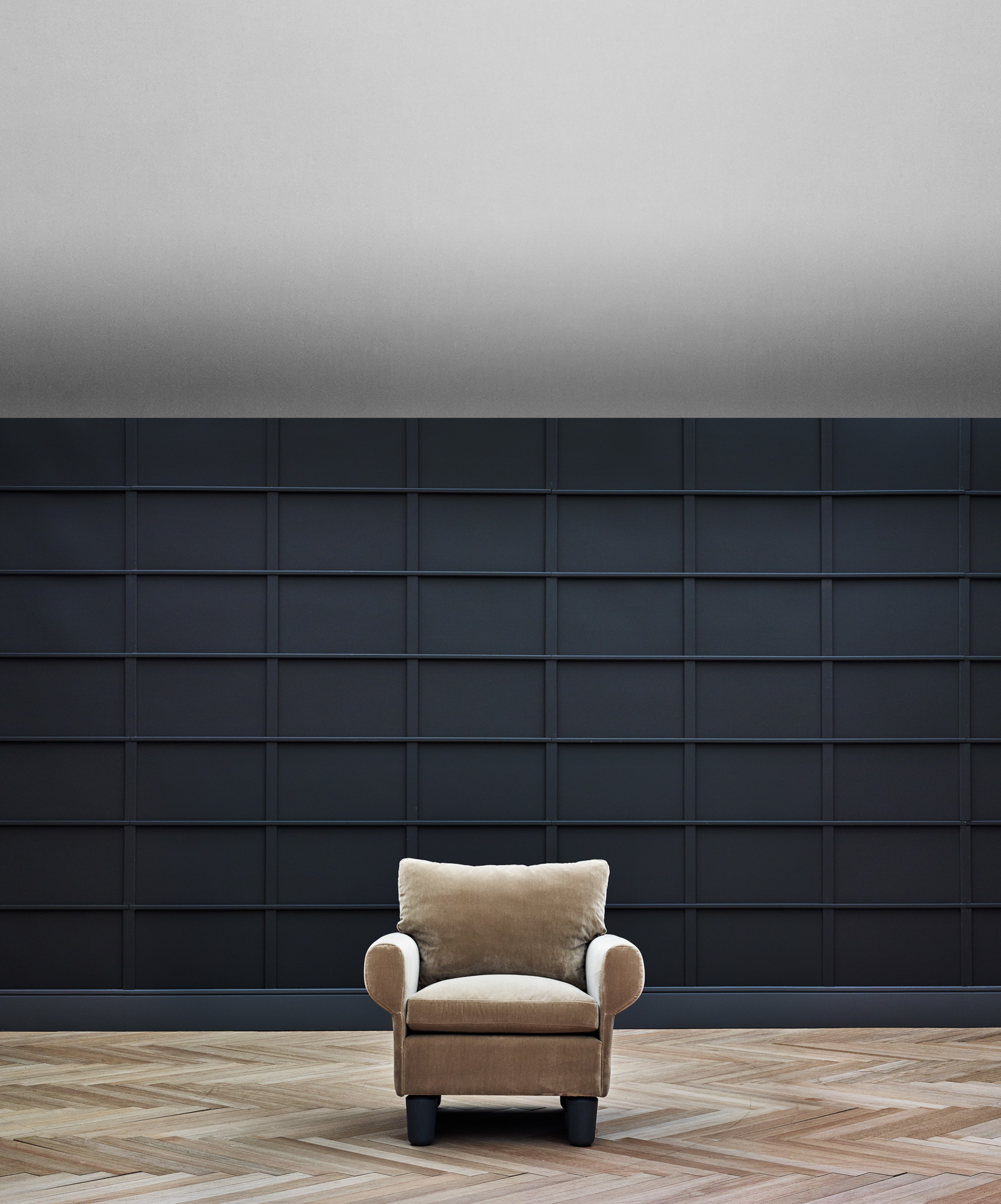 Magnus armchair, suspended base version on oak legs. Designed by Mario Ruiz for Joquer.
