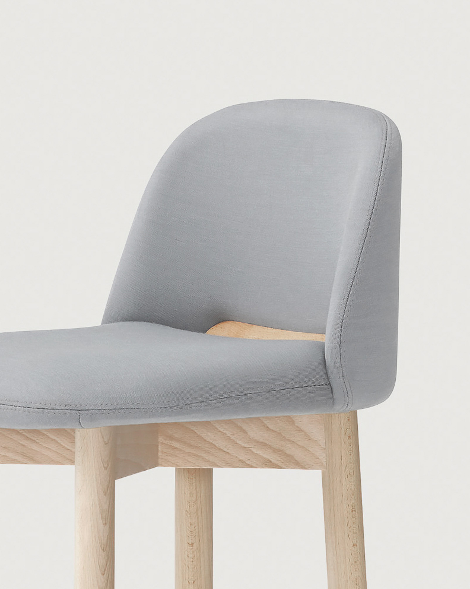 Nara barstool with solid wood structure designed by Mario Ruiz for Capdell