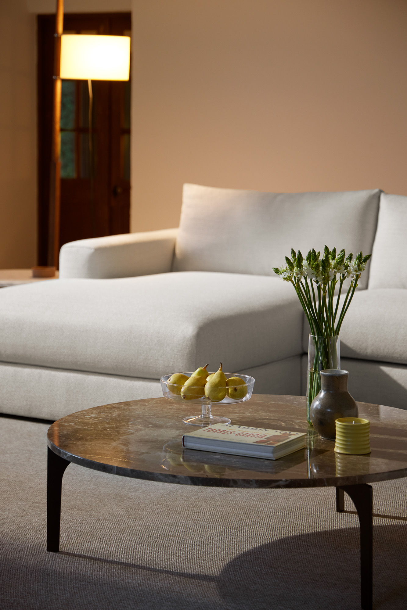 Padi coffee table with Emperador marble top designed by Mario Ruiz for Joquer