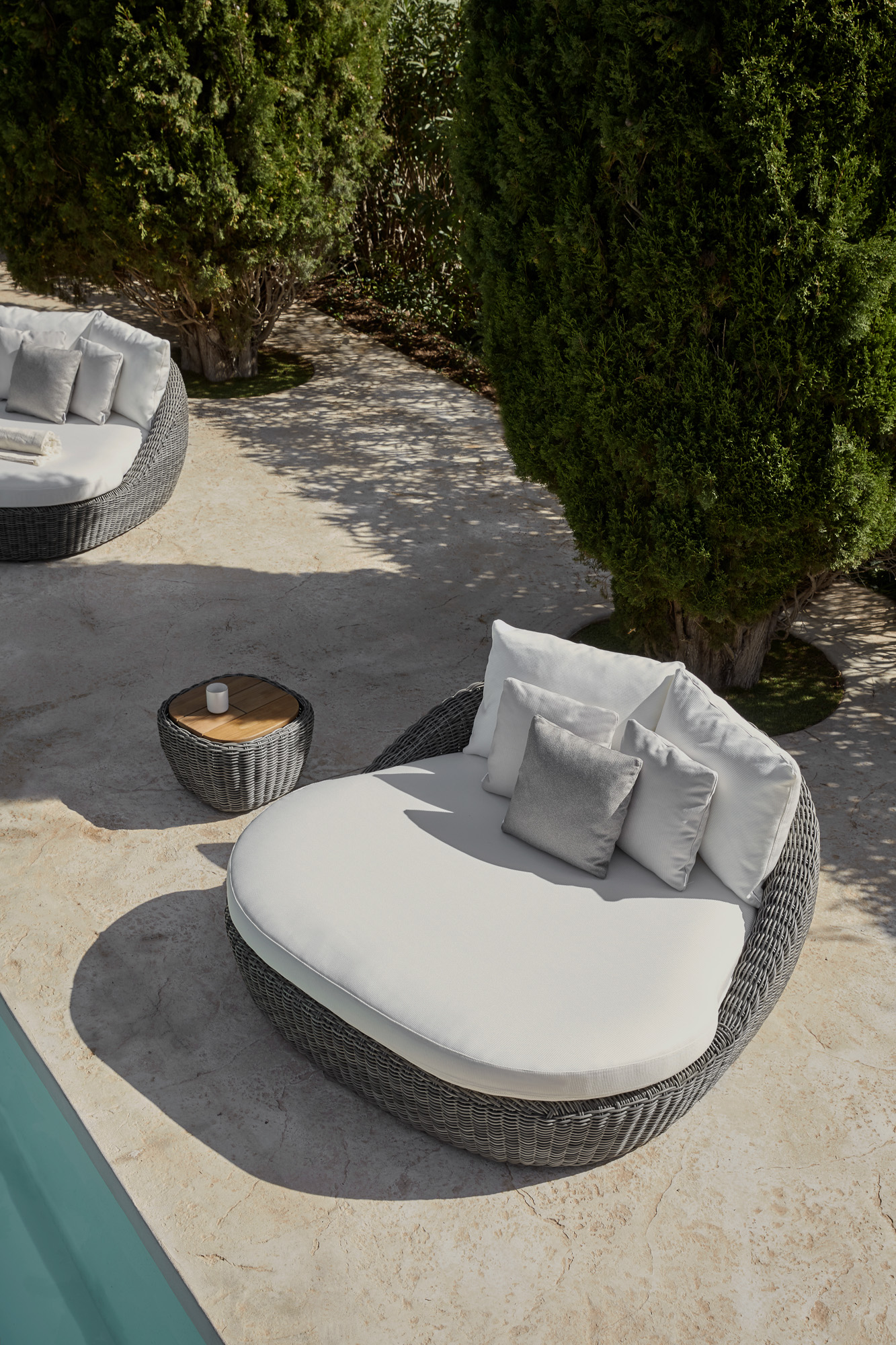 Heritage Outdoor daybed and side table designed by Mario Ruiz for POINT