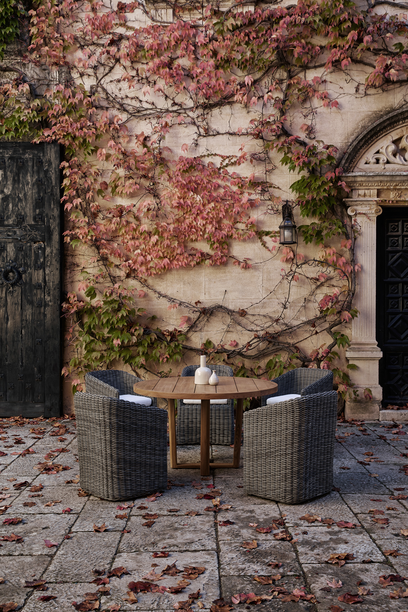 Heritage Outdoor Collection round dining table and dining chairs designed by Mario Ruiz for POINT
