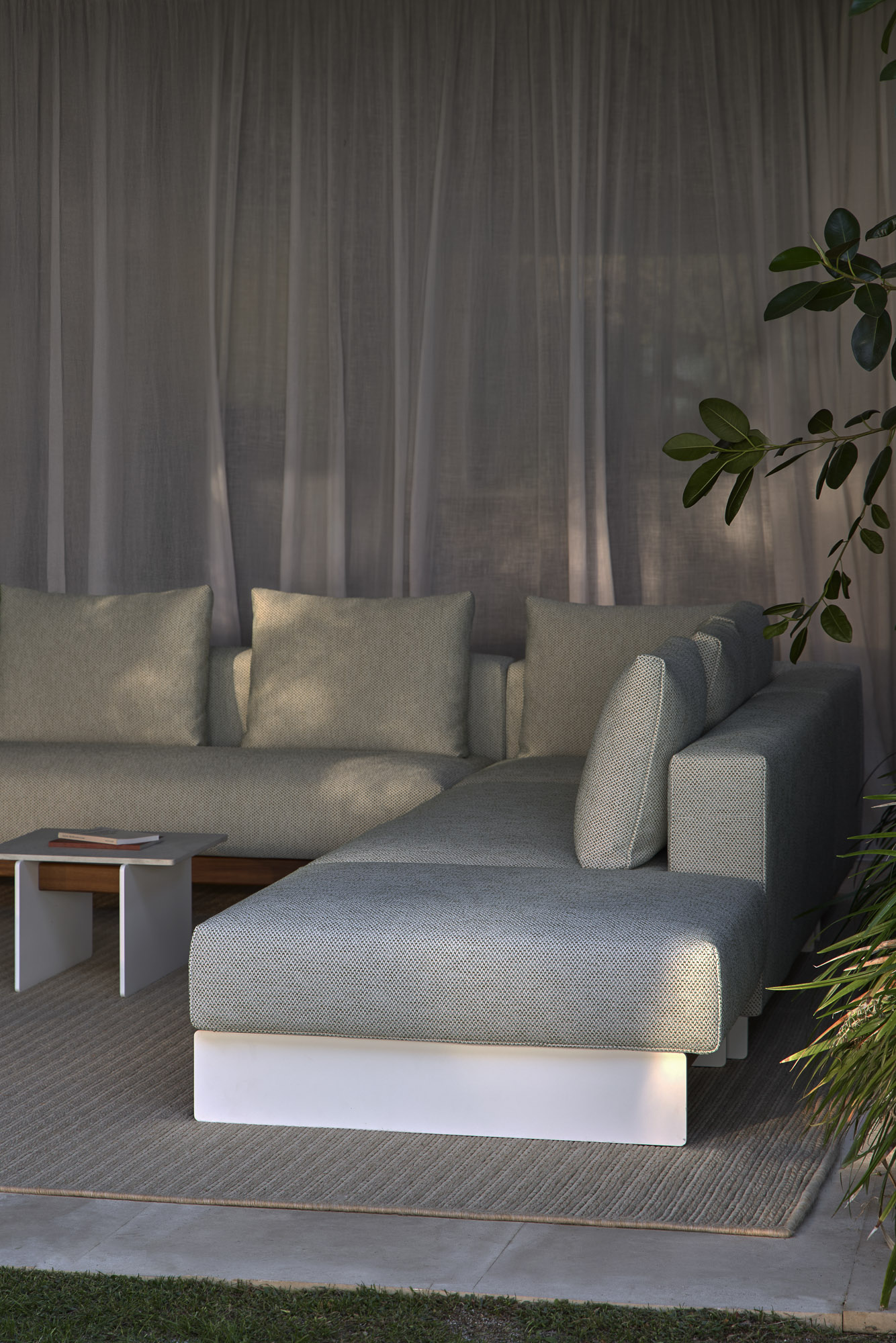 Sledd outdoor sofa ssytem and Axis table designed by Mario Ruiz for Joquer
