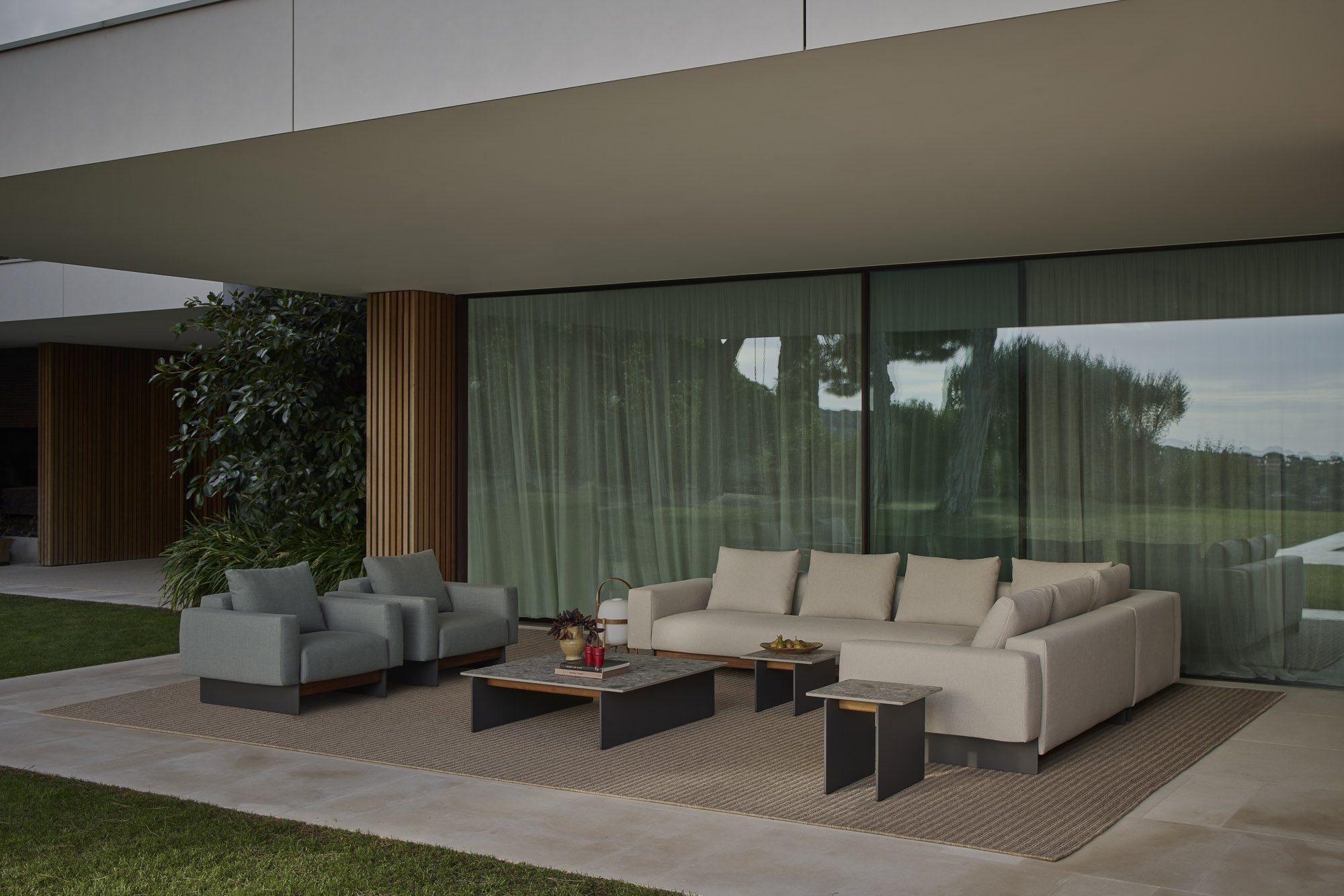 Sledd outdoor collection and Axis Outdoor table designed by Mario Ruiz for Joquer