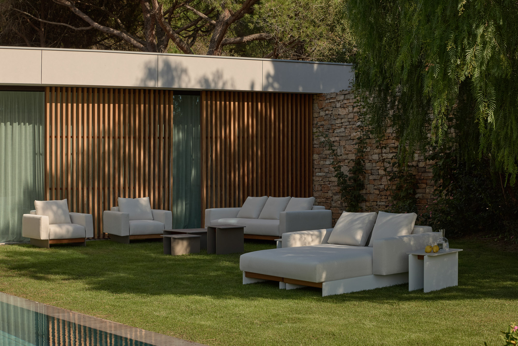 Sledd outdoor collection and Axis Outdoor tables designed by Mario Ruiz for Joquer