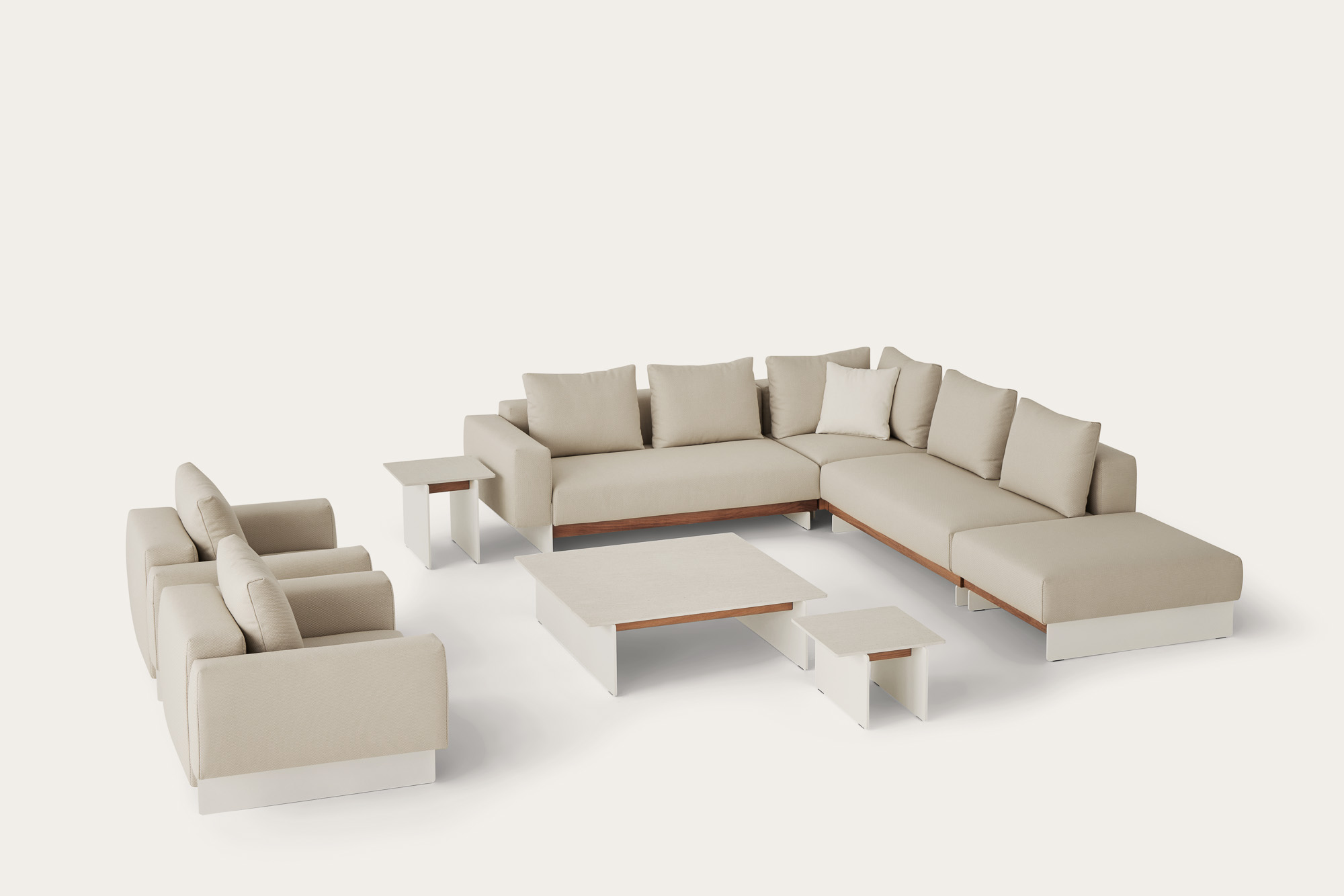 Sledd Outdoor sofa and lounge chair and Axis Outdoor tables designed by Mario Ruiz for Joquer