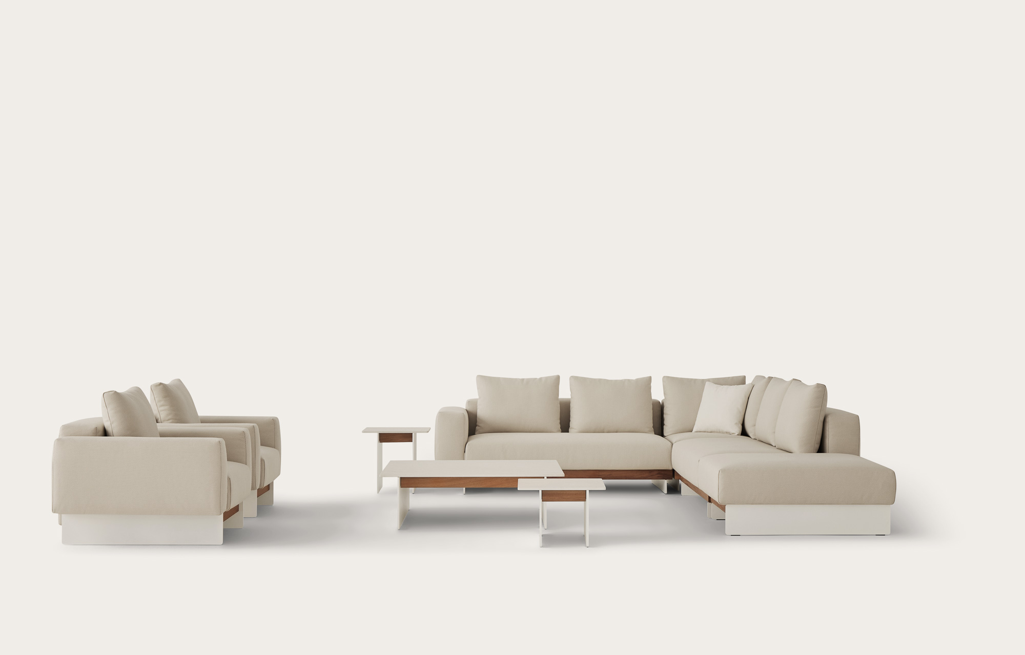 Sledd Outdoor sofa and lounge chair and Axis Outdoor tables designed by Mario Ruiz for Joquer